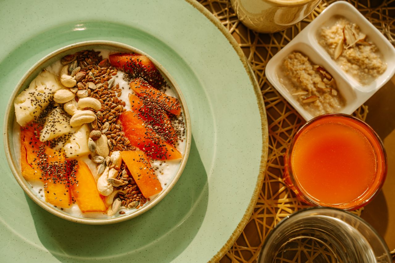 services-03 A vibrant breakfast bowl with yogurt, fruits, and seeds, perfect for a healthy morning start.